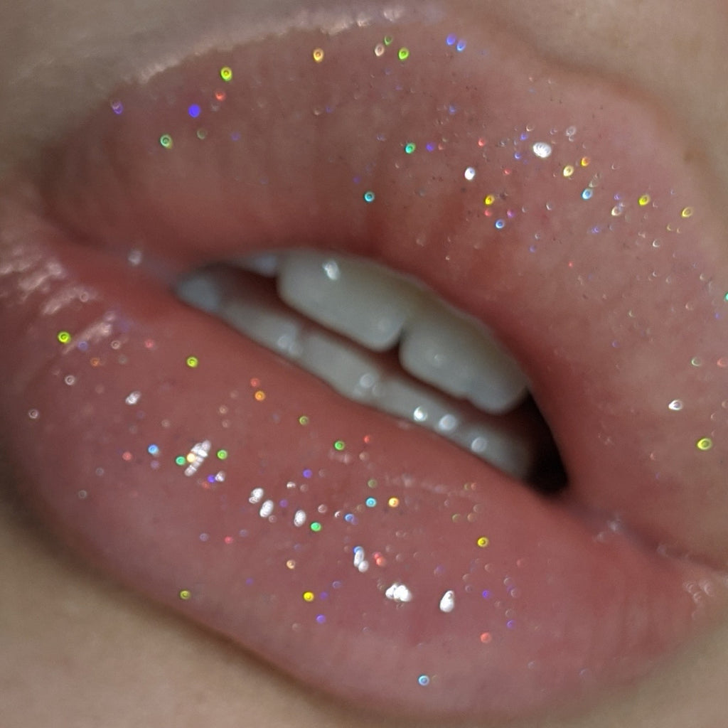 birthday cake holographic glitter lip gloss on lips sparkling